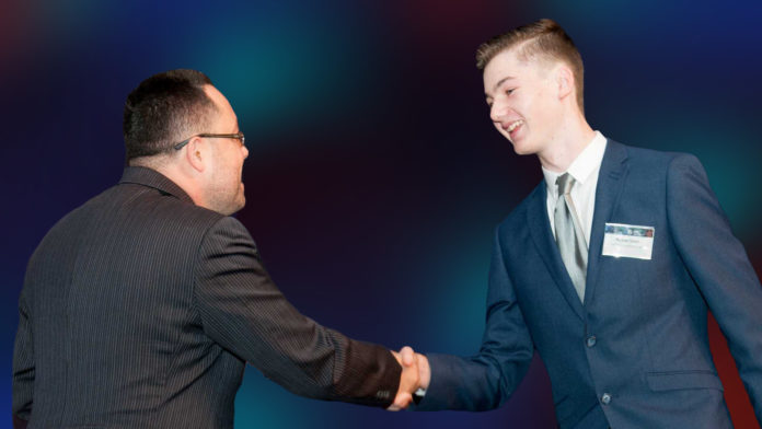 Professor Michael Blumenstein (UTS) shakes hands with Michael Nixon (EduKits)